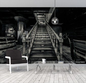 Bild på Wooden staircase Interior of old pirate ship Black and white 